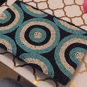 Small hand beaded clutch